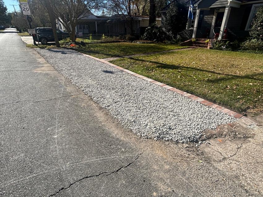 Gravel parking pad with brick border detail - Baton Rouge